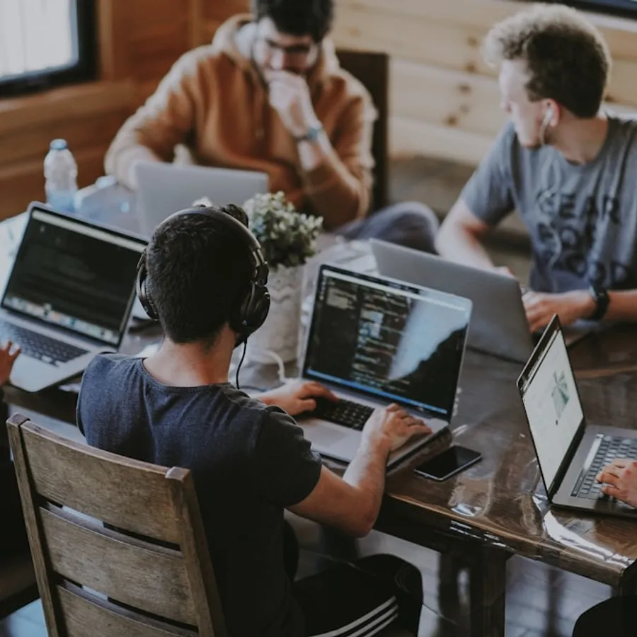 Product team collaborating on a laptop